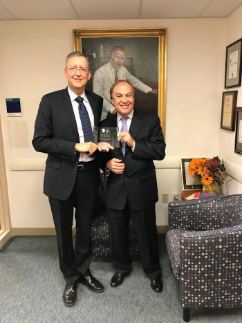 Chief of BCH Ophthalmology, Dr. David Hunter, presents commemorative plaque to visiting professor Dr. Gerald Zaidman in November 2017.
