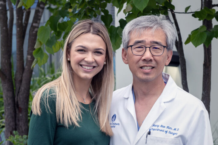 Patient Reagan (left) with Boston Children's Dr. Heung Bae Kim.