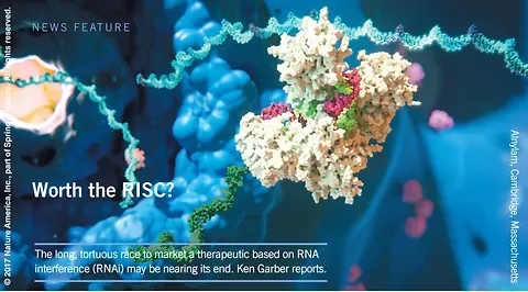 A microscopic image of RNAi with white text that reads: Worth the RISC? The long torturous race to market a therapeutic based on RNA inference (RNAi) may be nearing its end, Ken Garber reports.  